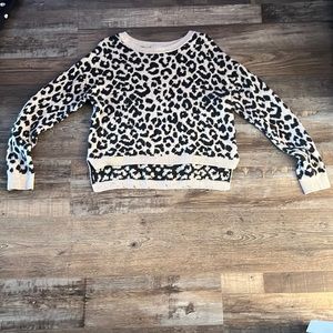 A sweater cheetah print size small